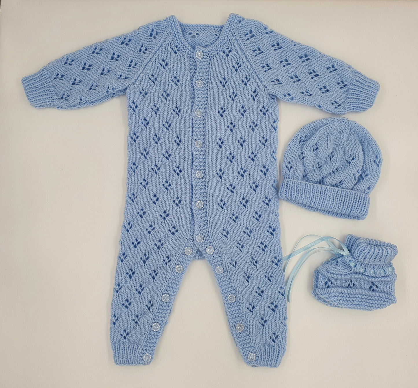 Printed Knitting Pattern 106 – Lacy All-In-One Romper Set - DollieBabies