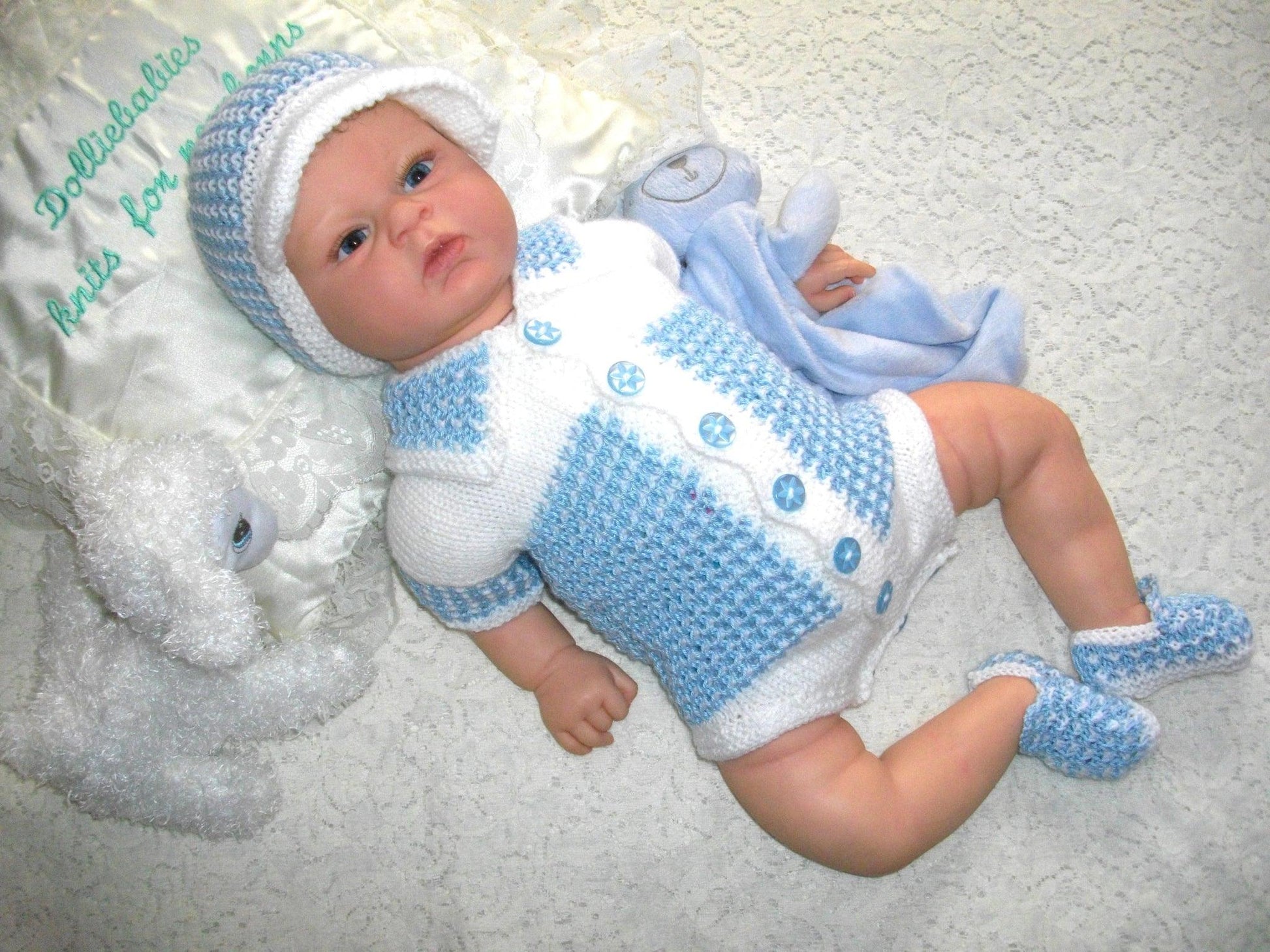 knitting pattern for a baby bodysuit that looks like a shirt - DollieBabies
