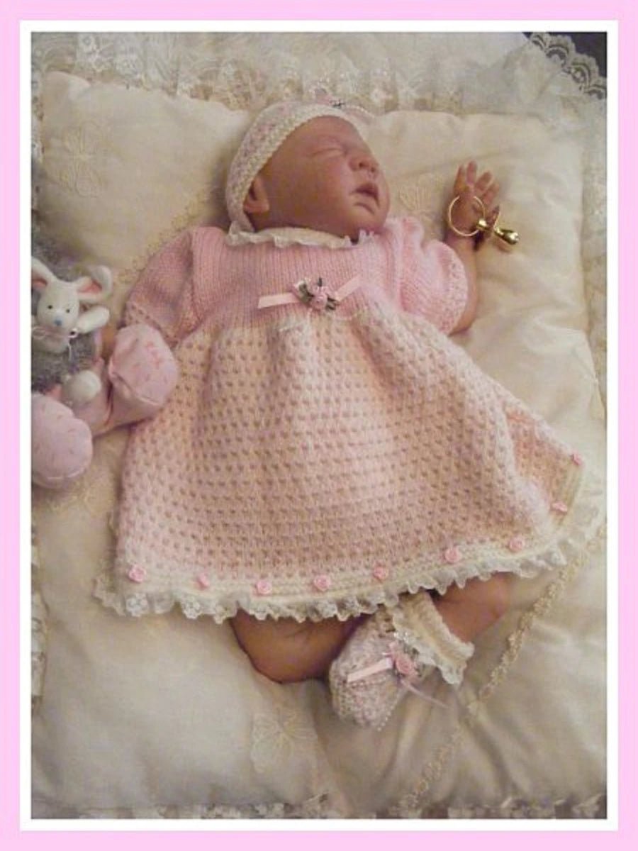 A PDF knitting pattern for a newborn baby girl dress set - DollieBabies